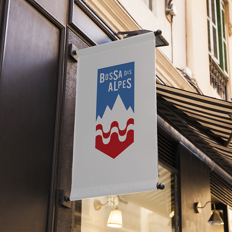 package made of craft paper with the small logo on the front and the big symbol on the back