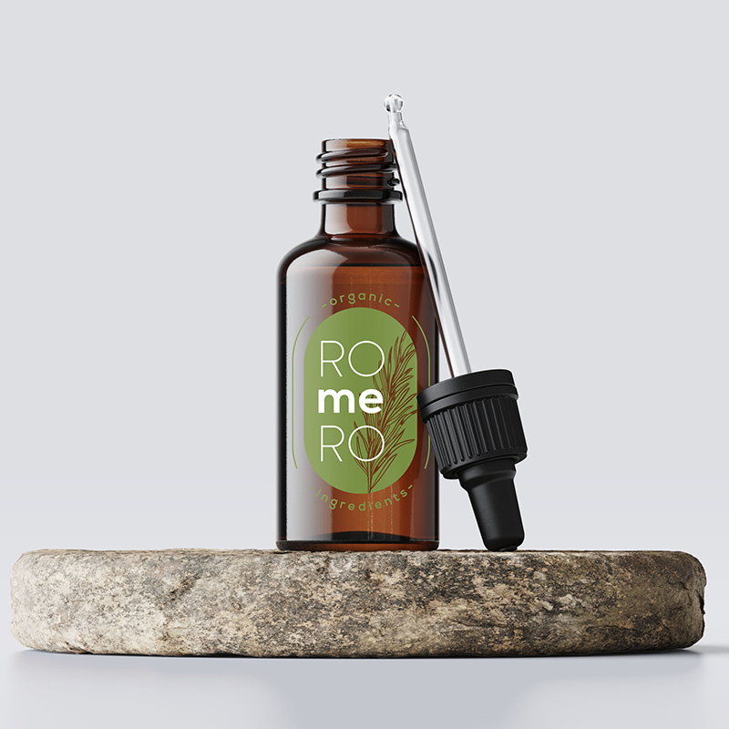 rosemary essence bottle with green label